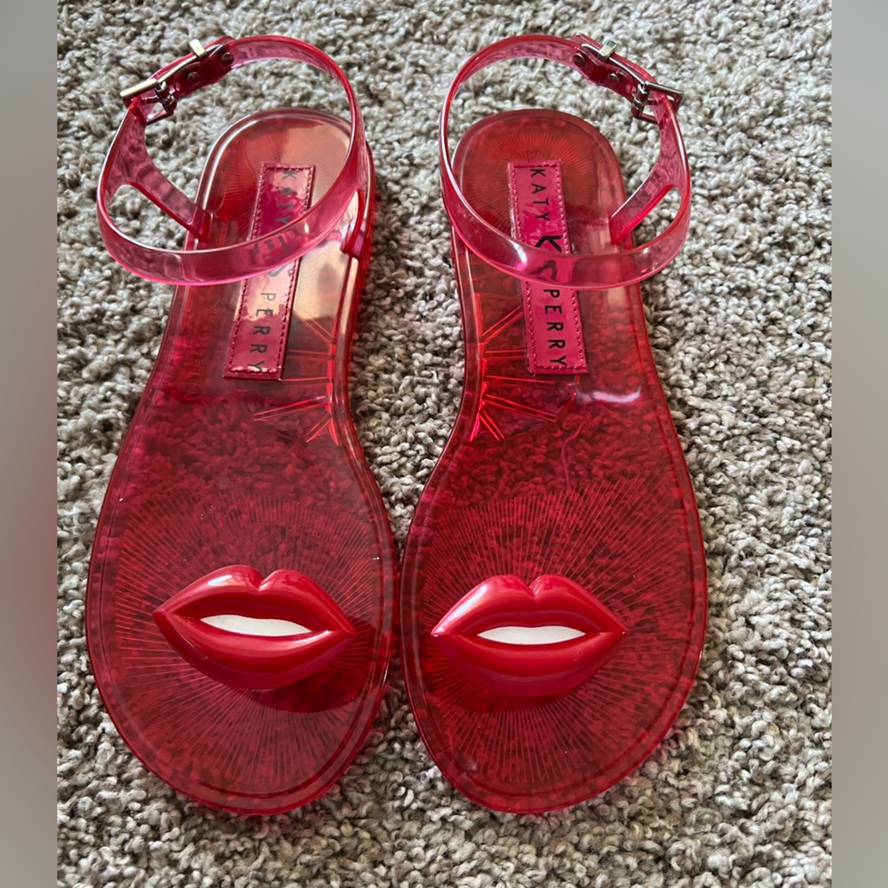 Katy Perry Jelly sandals. Red with Lips toe. Buckle closure. Size 7.